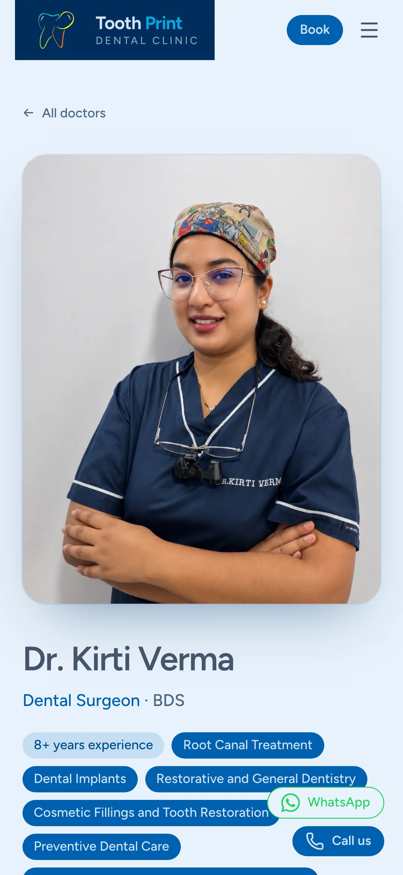 A Tooth Print doctor profile on a phone — credentials and specialisations, with WhatsApp and Call us sitting in thumb reach